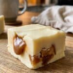 Close-up of a piece of apple pie fudge showing the caramel swirl.