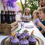A tray of purple grape soda cupcakes served at a birthday party with soda bottles in the background.