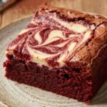 Close-up of a moist red velvet brownie texture.