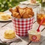 Places the dish in its most iconic context—as a side to fried chicken.