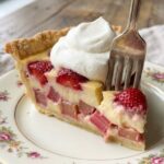 A close-up focusing on the unique "custard" texture of the interior, distinguishing it from a standard fruit pie.