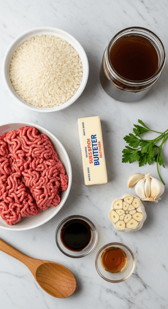 Ingredients for beef and rice skillet: beef, rice, garlic, butter, and broth.