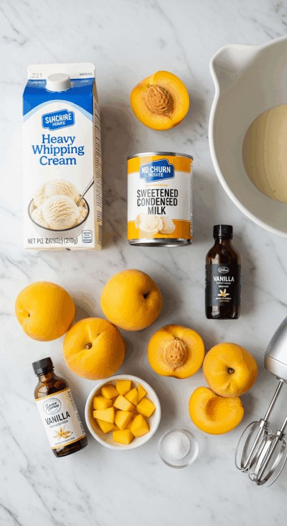 Ingredients for no-churn peach ice cream: heavy cream, condensed milk, fresh peaches, and vanilla.